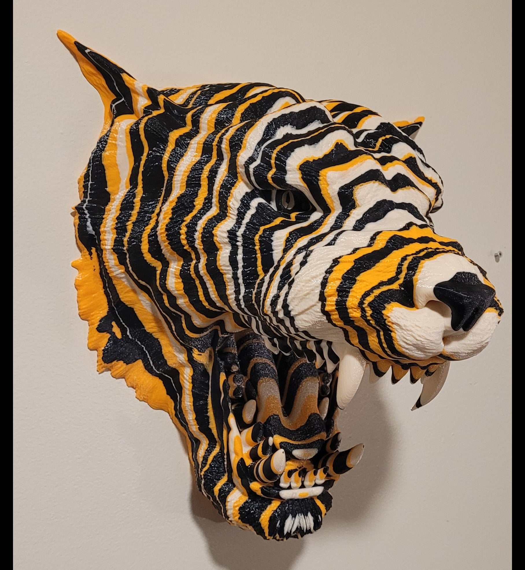 Tiger Head Plaque with black, white, and orange stripes on a light gray background