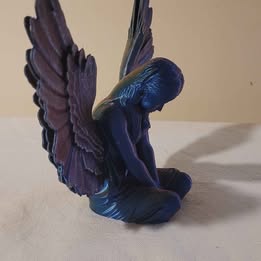 Kneeling praying angel