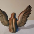 Kneeling praying angel